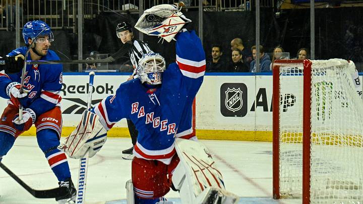Oct 4, 2026; New York, New York, USA;  New York Rangers goaltender Igor Shesterkin (31) makes a glove save against the Utah Mammoth during the first period at Madison Square Garden.  Mandatory Credit: Dennis Schneidler-Imagn Images