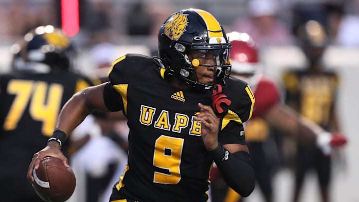 Aug 29, 2024; Little Rock, Arkansas, USA; Pine Bluff Golden Lions quarterback Mekhi Hagens (9) rushes in the second quarter against the Arkansas Razorbacks at War Memorial Stadium. Mandatory Credit: Nelson Chenault-Imagn Images