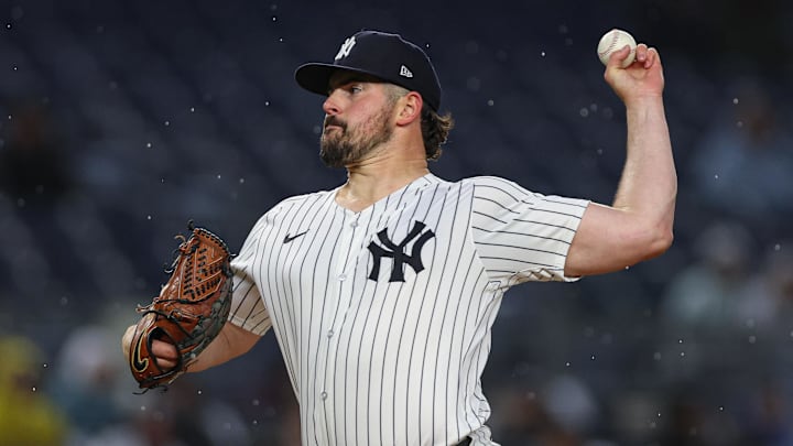 Apr 2, 2025; Bronx, New York, USA; New York Yankees starting pitcher Carlos Rodon (55) delivers a pitch during the first inning against the Arizona Diamondbacks at Yankee Stadium. 