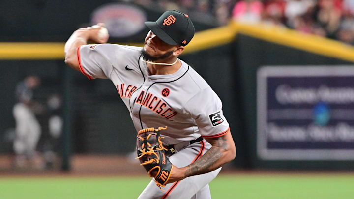 Sep 23, 2024; Phoenix, Arizona, USA;  San Francisco Giants pitcher Camilo Doval (75) throws in the eighth inning against the Arizona Diamondbacks at Chase Field. 