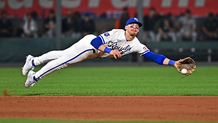Sep 18, 2024; Kansas City, Missouri, USA;  Kansas City Royals shortstop Bobby Witt Jr. (7) dives for the ball in the seventh inning against the Detroit Tigers at Kauffman Stadium. Mandatory Credit: Peter Aiken-Imagn Images