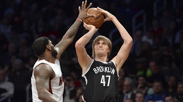 Jan 10, 2014; Brooklyn, NY, USA; Brooklyn Nets small forward Andrei Kirilenko (47) shoots over Miami Heat small forward LeBron James (6) during the second half at Barclays Center. The Brooklyn Nets won the game 104-95 in double overtime. Mandatory Credit: Joe Camporeale-Imagn Images Jan 10, 2014; Brooklyn, NY, USA; Brooklyn Nets small forward Andrei Kirilenko (47) shoots over Miami Heat small forward LeBron James (6) during the second half at Barclays Center. The Brooklyn Nets won the game 104-95 in double overtime. Mandatory Credit: Joe Camporeale-Imagn Images