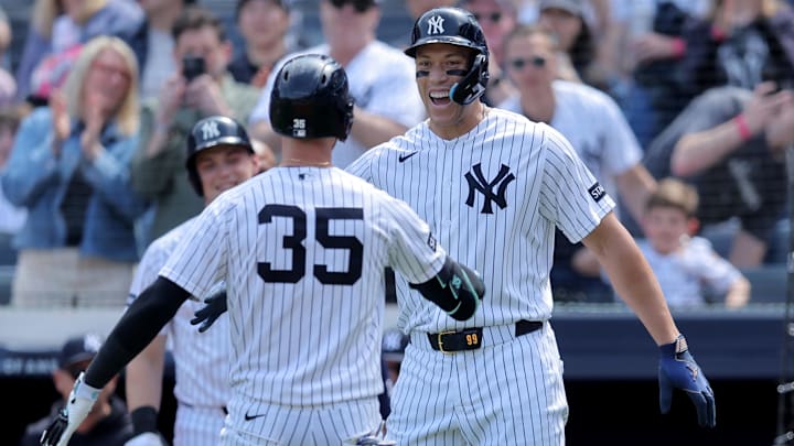 Apr 18, 2026; Bronx, New York, USA; New York Yankees center fielder Cody Bellinger (35) celebrates his two run home run against the Kansas City Royals with right fielder Aaron Judge (99) during the third inning at Yankee Stadium. Mandatory Credit: Brad Penner-Imagn Images
