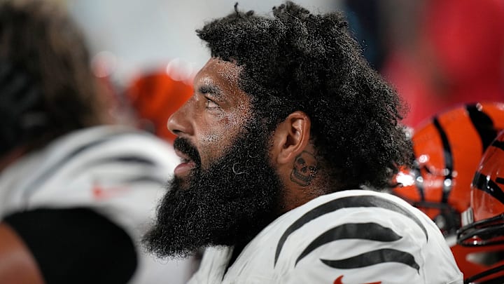 Cincinnati Bengals guard Cody Ford (61) during a timeout against the Indianapolis Colts Thursday, August 22, 2024 at Paycor Stadium.