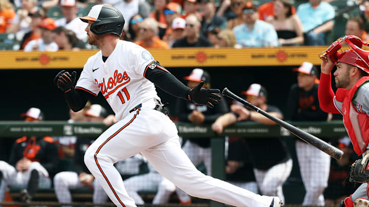 Apr 20, 2025; Baltimore, Maryland, USA; Baltimore Orioles third baseman Jordan Westburg (11) hits a double during the second inning against the Cincinnati Reds at Oriole Park at Camden Yards.