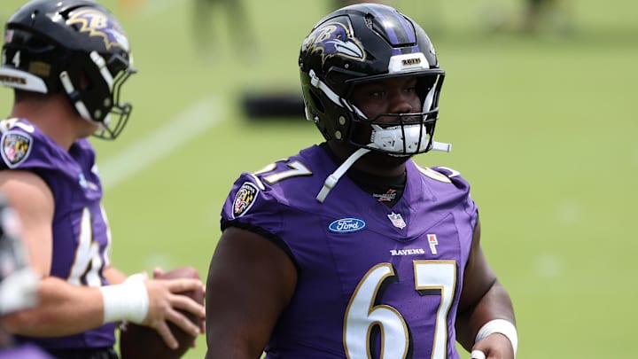 Jun 10, 2025; Baltimore, MD, USA; Baltimore Ravens offensive tackle Corey Bullock (67) looks on during an NFL OTA at Under Armour Performance Center. Mandatory Credit: Daniel Kucin Jr.-Imagn Images
