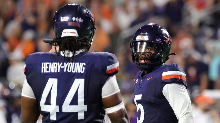 Sep 11, 2026; Charlottesville, Virginia, USA;  Virginia Cavaliers linebacker Kam Robinson (5) looks on during the second quarter against the Norfolk State Spartans at Scott Stadium.  Mandatory Credit: Amber Searls-Imagn Images