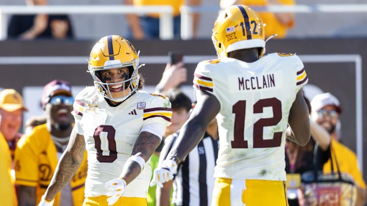 Oct 18, 2025; Tempe, Arizona, USA; Arizona State Sun Devils wide receiver Jordyn Tyson (0) celebrates a touchdown with teammate Malik McClain (12) against the Texas Tech Red Raiders in the second half at Mountain America Stadium. Mandatory Credit: Mark J. Rebilas-Imagn Images