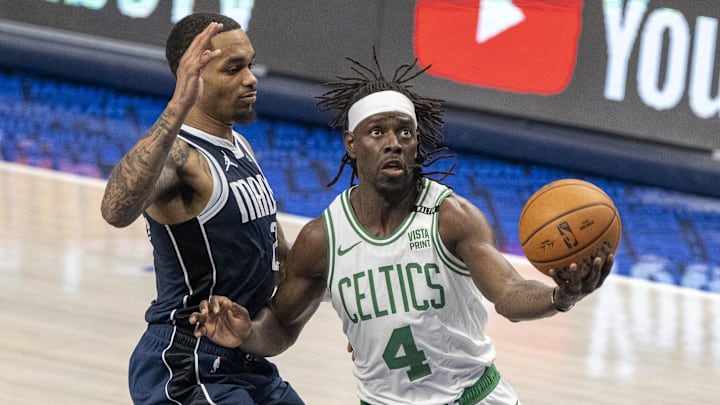 Jun 14, 2024; Dallas, Texas, USA; Dallas Mavericks forward P.J. Washington (25) and Boston Celtics guard Jrue Holiday (4) in action during the game between the Dallas Mavericks and the Boston Celtics in game four of the 2024 NBA Finals at American Airlines Center. Mandatory Credit: Jerome Miron-Imagn Images