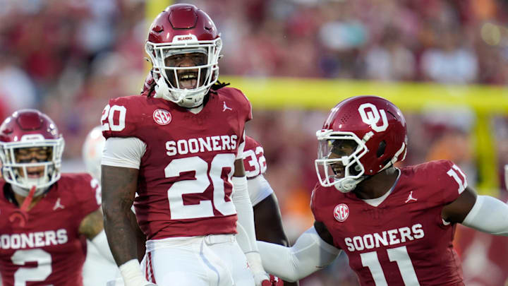 Oklahoma Sooners linebacker Lewis Carter (20) and linebacker Kobie McKinzie (11) celebrate during a college football game between the University of Oklahoma Sooners (OU) and the Tennessee Volunteers at Gaylord Family - Oklahoma Memorial Stadium in Norman, Okla., Saturday, Sept. 21, 2024.