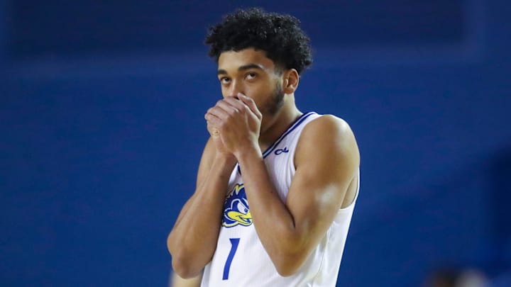Delaware's Izaiah Pasha warms his hands as the Blue Hens get underway against Monmouth in the first half at the Bob Carpenter Center in Newark, Del., Saturday, Jan. 4, 2025. Delaware's Izaiah Pasha warms his hands as the Blue Hens get underway against Monmouth in the first half at the Bob Carpenter Center in Newark, Del., Saturday, Jan. 4, 2025.
