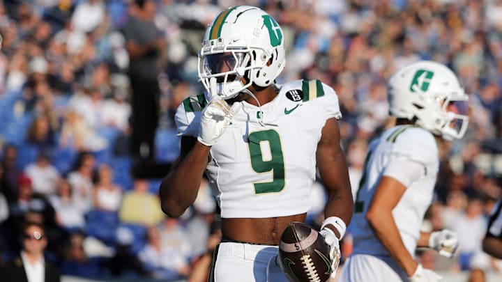 Oct 19, 2024; Annapolis, Maryland, USA; Charlotte 49ers wide receiver O'Mega Blake (9) celebrates after scoring a touchdown during the first half against the Navy Midshipmen at Navy-Marine Corps Memorial Stadium. Mandatory Credit: Daniel Kucin Jr.-Imagn Images