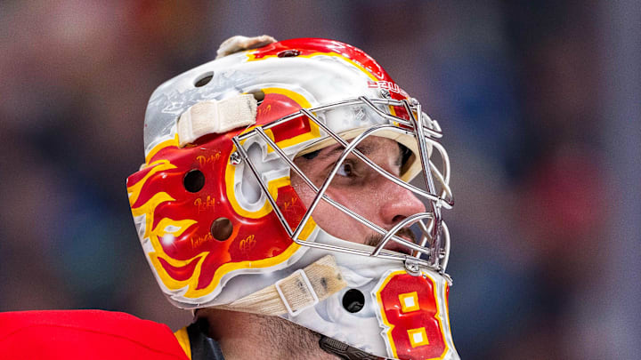 Nov 12, 2024; Vancouver, British Columbia, CAN; Calgary Flames goalie Dan Vladar (80) during a stop in play against the Vancouver Canucks during the second period at Rogers Arena. Mandatory Credit: Bob Frid-Imagn Images