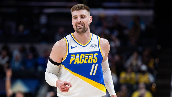 Mar 29, 2026; Indianapolis, Indiana, USA;  Indiana Pacers center Micah Potter (11) celebrates a made basket in the first half against the Miami Heat at Gainbridge Fieldhouse. Mandatory Credit: Trevor Ruszkowski-Imagn Images