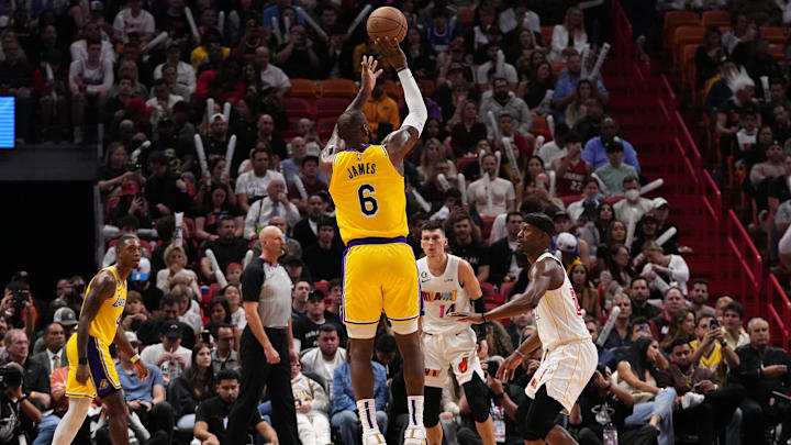 Dec 28, 2022; Miami, Florida, USA; Los Angeles Lakers forward LeBron James (6) attempts a three point shot against the Miami Heat during the second half at FTX Arena. Mandatory Credit: Jasen Vinlove-Imagn Images