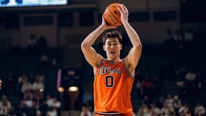 Illinois forward David Mirkovic (0) looks for a teammate Saturday in the Illini's 73-65 win over Penn State at The Palestra in Philadelphia.