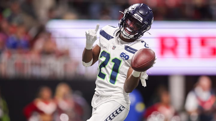 Dec 7, 2025; Atlanta, Georgia, USA; Seattle Seahawks cornerback Devon Witherspoon (21) celebrates after a fumble recovery against the Atlanta Falcons in the third quarter at Mercedes-Benz Stadium. Mandatory Credit: Brett Davis-Imagn Images