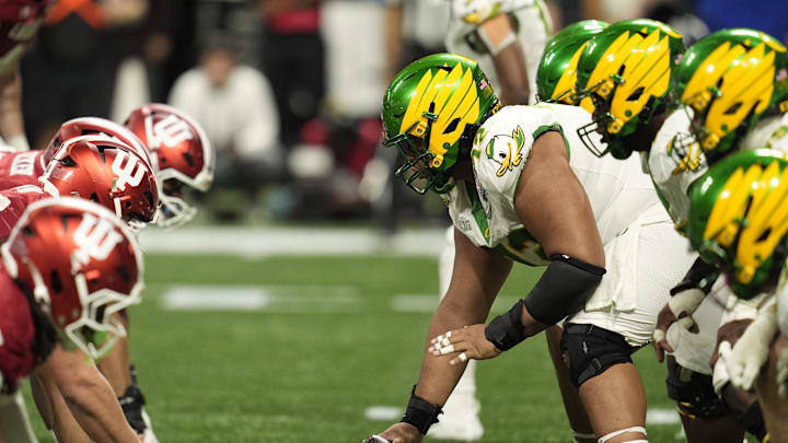 Run it back: Iapani "Poncho" Laloulu returns to anchor the Oregon offensive line next year, but the rest of the unit will have to be rebuilt.