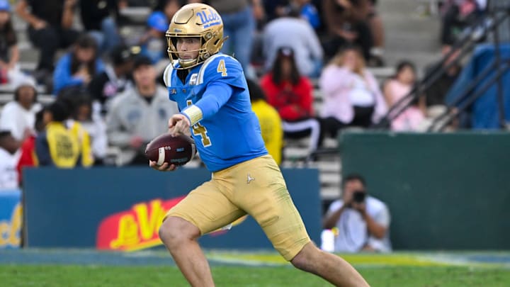 UCLA Bruins quarterback Ethan Garbers scrambles out of the pocket during the third quarter against the Fresno State Bulldogs.