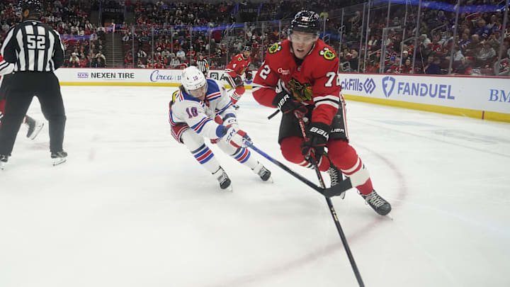 Jan 5, 2025; Chicago, Illinois, USA; New York Rangers left wing Artemi Panarin (10) defends Chicago Blackhawks defenseman Alex Vlasic (72) during the third period at United Center. Mandatory Credit: David Banks-Imagn Images Jan 5, 2025; Chicago, Illinois, USA; New York Rangers left wing Artemi Panarin (10) defends Chicago Blackhawks defenseman Alex Vlasic (72) during the third period at United Center. Mandatory Credit: David Banks-Imagn Images