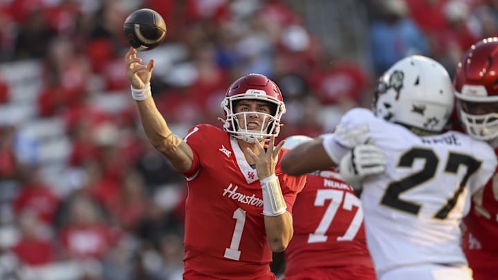 Sep 12, 2025; Houston, Texas, USA; Houston Cougars quarterback Conner Weigman (1) attempts a pass during the first quarter against the Colorado Buffaloes at TDECU Stadium. Mandatory Credit: Troy Taormina-Imagn Images