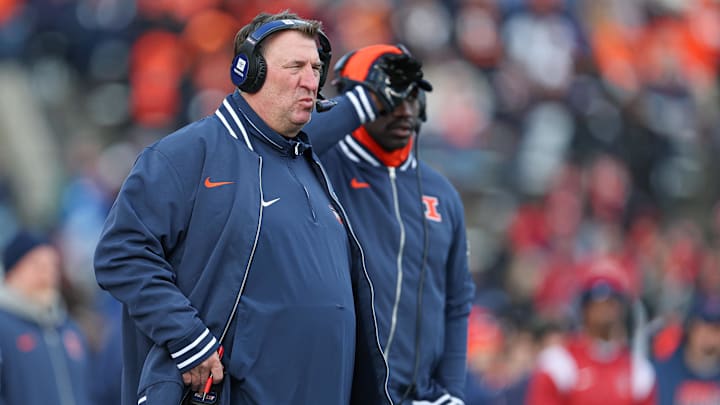Nov 23, 2024; Piscataway, New Jersey, USA; Illinois Fighting Illini head coach Bret Bielema looks on during the second half against the Rutgers Scarlet Knights at SHI Stadium. Mandatory Credit: Vincent Carchietta-Imagn Images