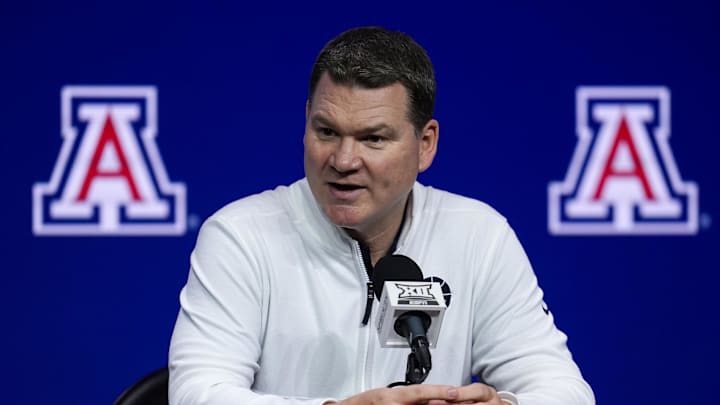 Oct 23, 2024; Kansas City, MO, USA; Arizona Wildcats head coach Tommy Lloyd talks to media during the Big 12 Men’s Basketball Media Day at T-Mobile Center. Oct 23, 2024; Kansas City, MO, USA; Arizona Wildcats head coach Tommy Lloyd talks to media during the Big 12 Men’s Basketball Media Day at T-Mobile Center.