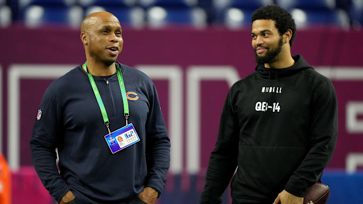 Mar 2, 2024; Indianapolis, IN, USA; Chicago Bears quarterbacks coach Kerry Joseph talks to Southern California quarterback Caleb Williams (QB14) during the 2024 NFL Combine at Lucas Oil Stadium. Mandatory Credit: Kirby Lee-Imagn Images