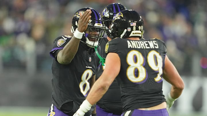 Dec 1, 2024; Baltimore, Maryland, USA; Baltimore Ravens tight end Mark Andrews (89) congratulated by quarterback Lamar Jackson (8) after his first quarter touchdown catch against the Philadelphia Eagles at M&T Bank Stadium. Mandatory Credit: Mitch Stringer-Imagn Images