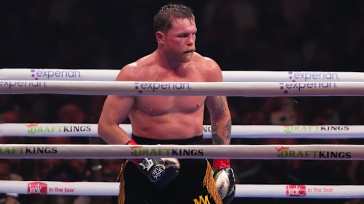 Canelo Alvarez (black/gold trunks) and Terence Crawford (not pictured) box during their super middleweight title bout  at Allegiant Stadium.