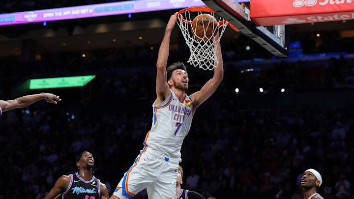 Jan 17, 2026; Miami, Florida, USA; Oklahoma City Thunder center Chet Holmgren (7) dunks against the Miami Heat during the first quarter at Kaseya Center. Mandatory Credit: Sam Navarro-Imagn Images