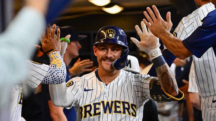 Sep 13, 2026; Milwaukee, Wisconsin, USA;  Milwaukee Brewers third baseman Joey Ortiz (3) is greeted in the dugout after hitting a two-run home run in the second inning against the Cincinnati Reds at American Family Field.  Mandatory Credit: Benny Sieu-Imagn Images