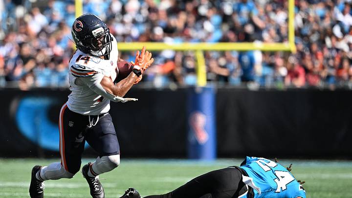 Chicago Bears wide receiver Kalif Raymond (14) with the ball as Carolina Panthers cornerback Will Lee III (24) defends Chicago Bears wide receiver Kalif Raymond (14) with the ball as Carolina Panthers cornerback Will Lee III (24) defends