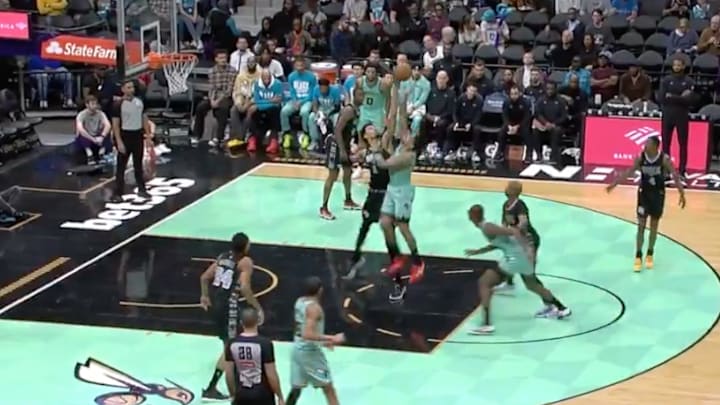 Wembanyama blocks Hornets guard DaQuan Jeffries's shot. 