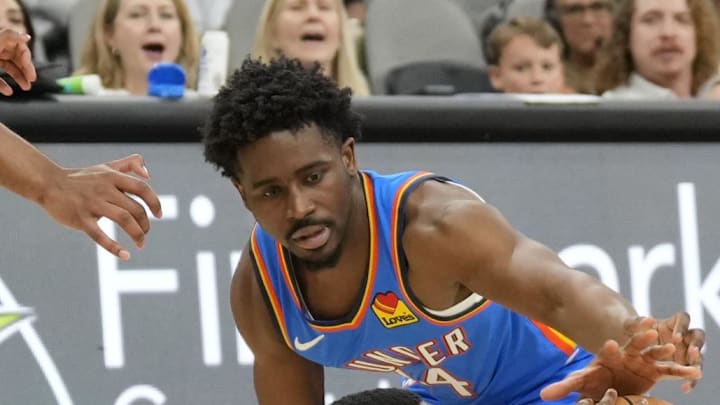 Oct 7, 2024; San Antonio, Texas, USA; San Antonio Spurs guard Blake Wesley (14) holds on to the ball while defended by Oklahoma City Thunder guard Adam Flagler (14) during the second half at Frost Bank Center. Mandatory Credit: Scott Wachter-Imagn Images Oct 7, 2024; San Antonio, Texas, USA; San Antonio Spurs guard Blake Wesley (14) holds on to the ball while defended by Oklahoma City Thunder guard Adam Flagler (14) during the second half at Frost Bank Center. Mandatory Credit: Scott Wachter-Imagn Images