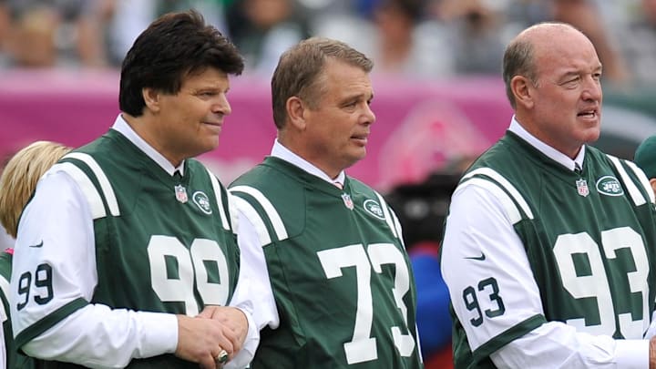 Oct 13, 2013; East Rutherford, NJ, USA; New York Jets former players Mark Gastineau (99) and Joe Klecko (73) and Marty Lyons serve as honorary captains during the coin toss before the New York Jets faced the Pittsburgh Steelers at MetLife Stadium. The Steelers won the game 19-6. Oct 13, 2013; East Rutherford, NJ, USA; New York Jets former players Mark Gastineau (99) and Joe Klecko (73) and Marty Lyons serve as honorary captains during the coin toss before the New York Jets faced the Pittsburgh Steelers at MetLife Stadium. The Steelers won the game 19-6.