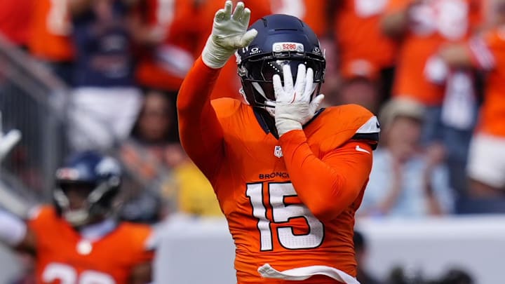 Sep 7, 2025; Denver, Colorado, USA; Denver Broncos linebacker Nik Bonitto (15) reacts after a play against the Tennessee Titans in the first half at Empower Field at Mile High. Mandatory Credit: Ron Chenoy-Imagn Images