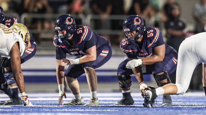 Chaminade offensive linemen take position before the snap of the ball against Oaks Christian.