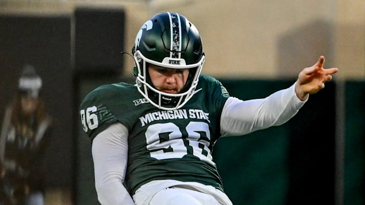 Michigan State's Ryan Eckley punts the ball against Penn State during the second quarter on Saturday, Nov. 15, 2025, at Spartan Stadium in East Lansing.