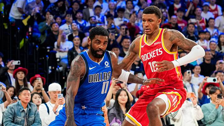 Oct 11, 2026; Macau, CHN; Dallas Mavericks guard Kyrie Irving (11) dribbles the ball against Houston Rockets forward Jabari Smith Jr. (10) during the NBA China Games at The Venetian Arena. Mandatory Credit: Vernon Bryant-Dallas Mavericks via Imagn Images Oct 11, 2026; Macau, CHN; Dallas Mavericks guard Kyrie Irving (11) dribbles the ball against Houston Rockets forward Jabari Smith Jr. (10) during the NBA China Games at The Venetian Arena. Mandatory Credit: Vernon Bryant-Dallas Mavericks via Imagn Images