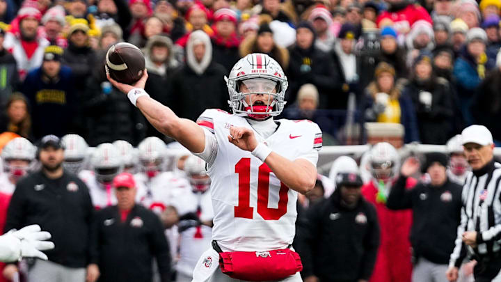 Ohio State Buckeyes quarterback Julian Sayin (10) makes a pass against the Michigan Wolverines in the first half of the NCAA football game at Michigan Stadium on Saturday, Nov. 29, 2025 in Ann Arbor, Michigan.