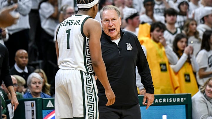 Michigan State's coach Tom Izzo, right, talks with Jeremy Fears Jr. during the second half in the game against Arkansas on Saturday, Nov. 8, 2025, at the Breslin Center in East Lansing.