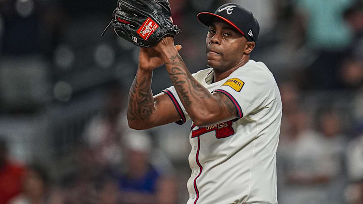 Atlanta Braves relief pitcher Raisel Iglesias stretche