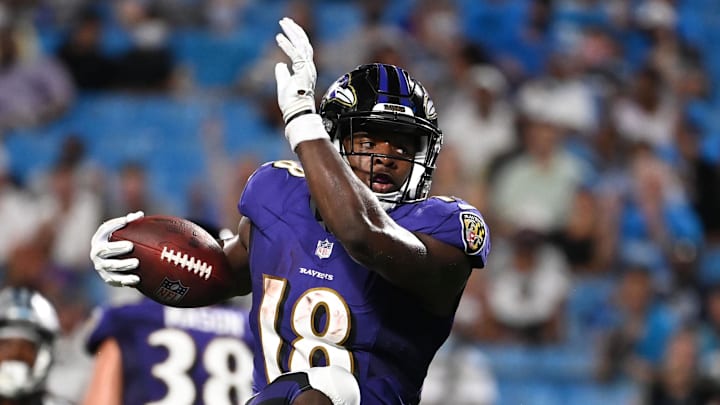 Aug 21, 2021; Charlotte, North Carolina, USA;  Baltimore Ravens running back Nate McCrary (18) with