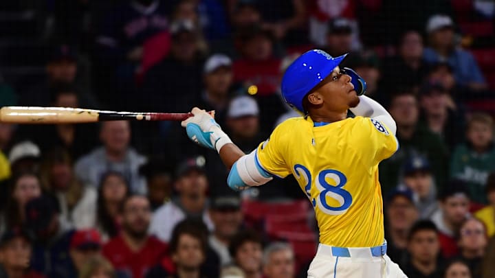 May 24, 2025; Boston, Massachusetts, USA;  Boston Red Sox second baseman Kristian Campbell (28) hits a single during the seventh inning against the Baltimore Orioles at Fenway Park. Mandatory Credit: Bob DeChiara-Imagn Images