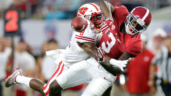 Wisconsin Badgers cornerback Sojourn Shelton (8) breaks up a long pass intended for Alabama Crimson Tide wide receiver Calvin Ridley (3) during the football season opener between Wisconsin and Alabama in 2015 in Arlington, Texas.  The Badgers and Crimson Tide will meet again in 2024 and 2025.Uwgrid06 08of X Spt Wooddf