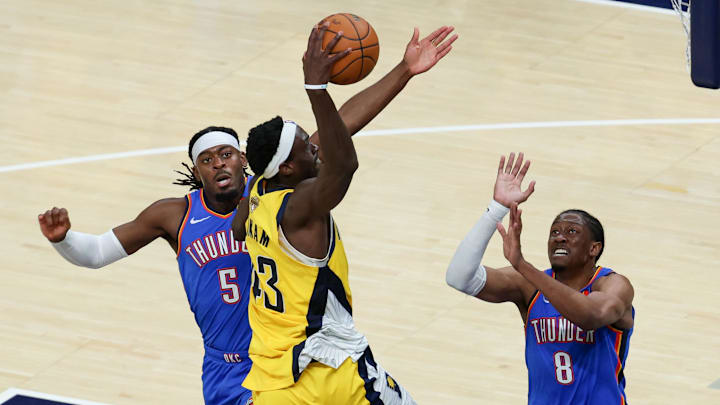 Jun 19, 2025; Indianapolis, Indiana, USA; Indiana Pacers forward Pascal Siakam (43) shoots the ball defended by Oklahoma City Thunder guard Luguentz Dort (5) and Oklahoma City Thunder forward Jalen Williams (8) in the second quarter during game six of the 2025 NBA Finals at Gainbridge Fieldhouse. Mandatory Credit: Trevor Ruszkowski-Imagn Images Jun 19, 2025; Indianapolis, Indiana, USA; Indiana Pacers forward Pascal Siakam (43) shoots the ball defended by Oklahoma City Thunder guard Luguentz Dort (5) and Oklahoma City Thunder forward Jalen Williams (8) in the second quarter during game six of the 2025 NBA Finals at Gainbridge Fieldhouse. Mandatory Credit: Trevor Ruszkowski-Imagn Images