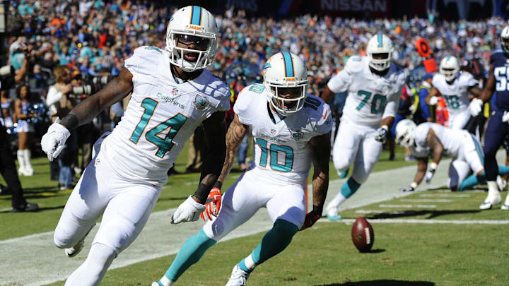 Miami Dolphins receiver Jarvis Landry (14) celebrates after scoring a touchdown during the first half against the Tennessee Titans at Nissan Stadium in 2015.