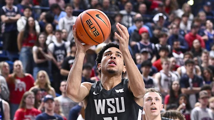 Feb 10, 2026; Spokane, Washington, USA; Washington State Cougars guard Ace Glass (21) shoots the ball against the Gonzaga Bulldogs in the second half  at McCarthey Athletic Center. Mandatory Credit: James Snook-Imagn Images