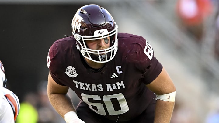 Sep 27, 2025; College Station, Texas, USA; Texas A&M Aggies offensive lineman Trey Zuhn III (60) lines up during the fourth quarter against the Auburn Tigers at Kyle Field. Mandatory Credit: Maria Lysaker-Imagn Images 